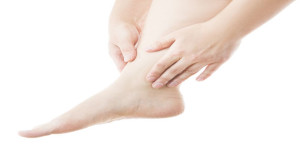 Massage Of Female Feet Isolated On White Background